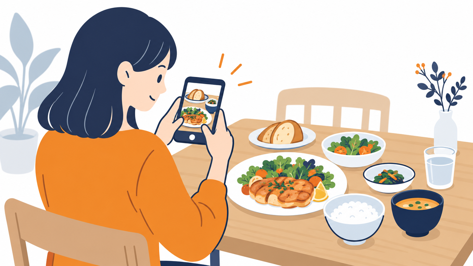 テーブルに並んだ料理を、お客様がスマートフォンで撮影している場面